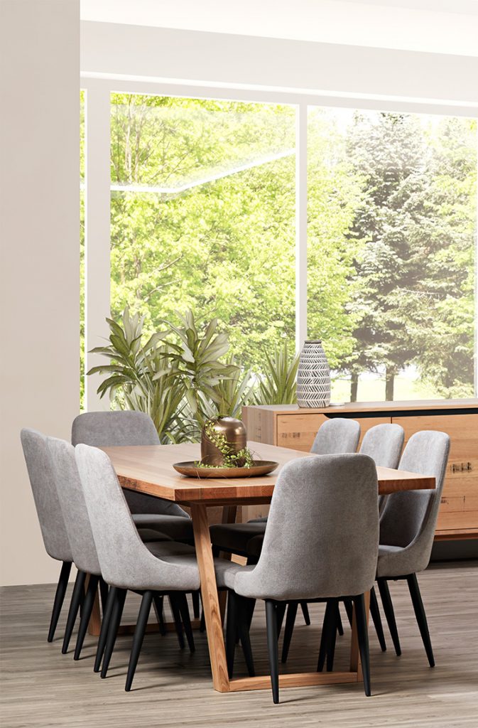Modern wooden dining table and grey upholstered chairs
